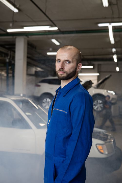 Mechanic in blue coverall